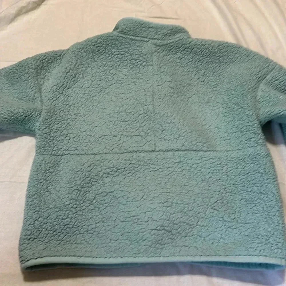 The North Face girls light blue fleece full zip jacket size M 10-12